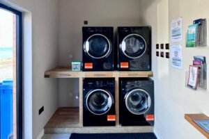 Guest laundry room Washing machines and tumble dryers in the guest laundry room
